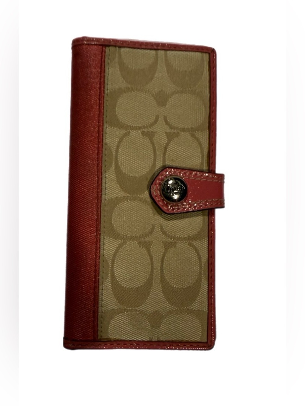 Coach signature monogram canvas wallet with pink trim and a snap-button
